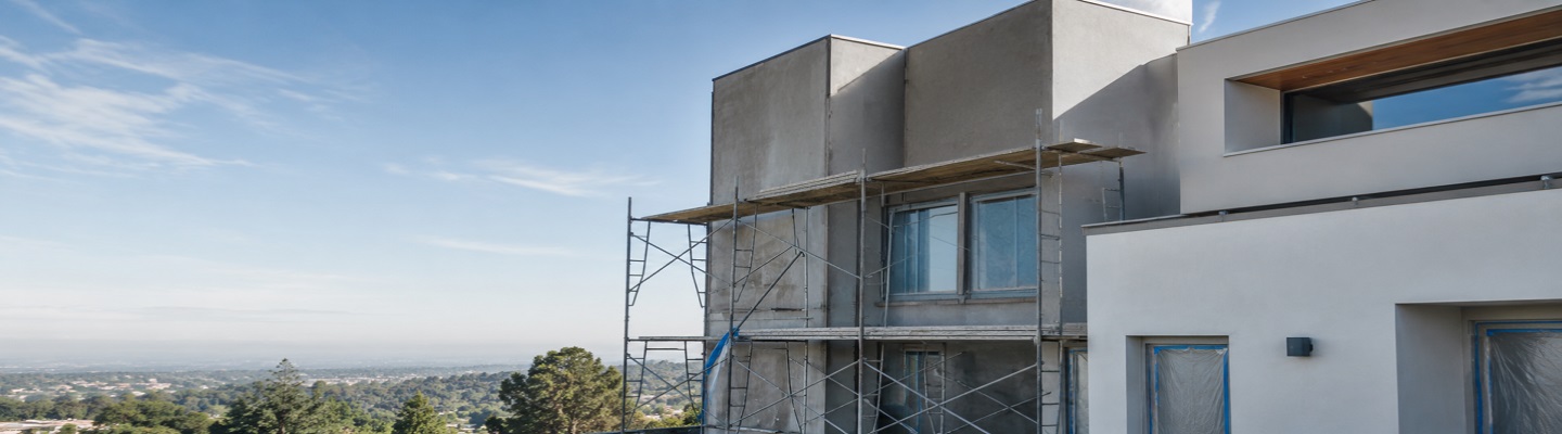 Stucco work on a modern building exterior